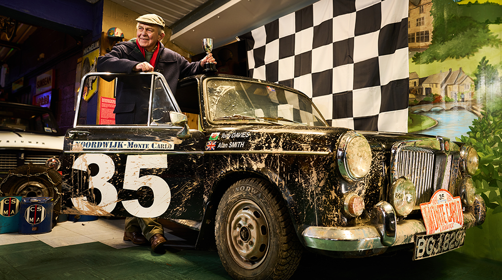Alan Smith posing with the 1963 MG 1100 and his trophy from the Monte Carlo Challenge